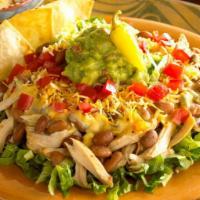 Reynosa Salad · Hand-tossed, fresh lettuce topped generously with your choice of seasoned ground beef or slo...