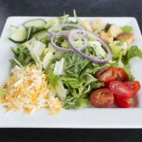 House Side Salad · Field greens, cheese, cucumbers, red onions, croutons, tomatoes, served with house made ranc...