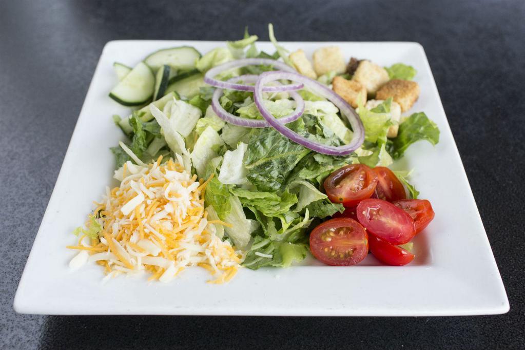 House Side Salad · Field greens, cheese, cucumbers, red onions, croutons, tomatoes, served with house made ranch dressing on the side.