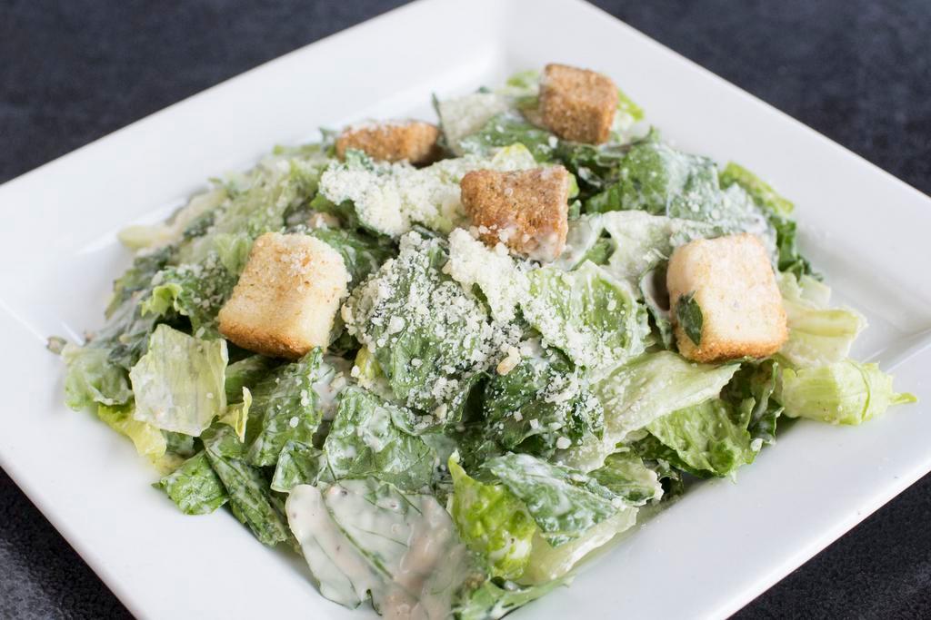 Caesar Side Salad · Romaine, Parmesan, croutons, tossed with house made Caesar dressing.