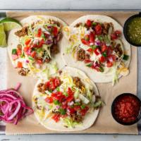 Beef Street Tacos · 3 tacos. Queso dip, cheese, shredded lettuce, pico de gallo.