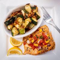 Grilled Salmon · Seasoned with Chili Mango, Cajun Rub or Savory Garlic, cilantro lime rice, roasted Parmesan ...