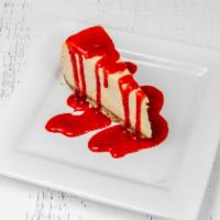New York-Style Cheesecake · Creamy cheesecake, strawberry sauce.