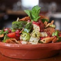 Fattoush Salad · Fattoush is a fresh traditional Lebanese salad mixed with lettuce, tomatoes, cucumbers, radi...