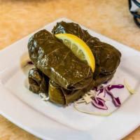 4 Piece Grape Leaves · 4 pieces. Grape leaves are a vegetarian dish stuffed with a mixture of short-grain rice, tom...