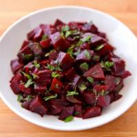 Beet Salad · Our fresh homemade beet salad, mixed with fresh lemon, balsamic vinaigrette and black pepper.