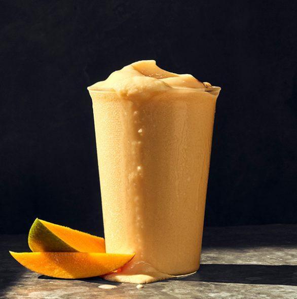 Mango Smoothie · 290 Cal. Mango fruit base mixed with orange juice and banana puree blended with plain Greek yogurt and ice. Allergens: Contains Milk