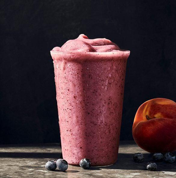 Peach & Blueberry Smoothie With Almondmilk · 210 Cal. Peach and mango purees and white grape and passionfruit juice concentrates blended with fresh blueberries and almondmilk. Allergens: Contains Tree Nuts