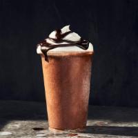 Frozen Chocolate Cold Brew · 450 Cal. Chocolate and an icy cold brew coffee blend topped with whipped cream and chocolate...