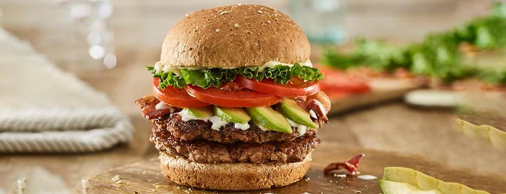 Double Avocado Club Burger · Double Certified Angus Beef, sliced avocado, applewood smoked bacon, lettuce, tomatoes, ranch, mayo, toasted multi-grain bun.