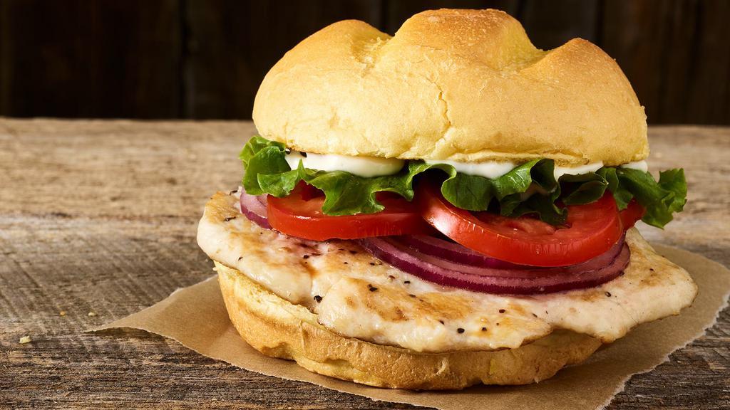 Classic Grilled Chicken Sandwich · Grilled chicken breast, lettuce, tomatoes, red onions, mayo, toasted bun.