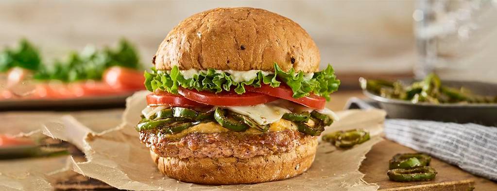 Colorado Turkey Burger · Turkey burger, pepper jack cheese, melted cheddar cheese, grilled Anaheim chiles, lettuce, tomatoes, mayo, toasted spicy chipotle bun.