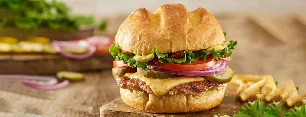 Classic Smash® Turkey Burger · Turkey burger, American cheese, lettuce, tomatoes, pickles, Smash Sauce®, ketchup, toasted bun.