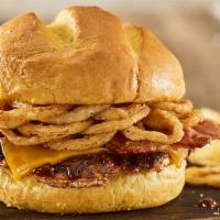 BBQ Bacon Cheddar Turkey Burger · Turkey burger, aged cheddar cheese, applewood smoked bacon, haystack onions, bbq sauce, toas...