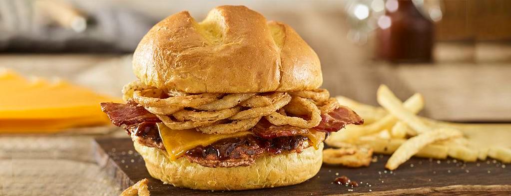 BBQ Bacon Cheddar Turkey Burger · Turkey burger, aged cheddar cheese, applewood smoked bacon, haystack onions, bbq sauce, toasted bun.