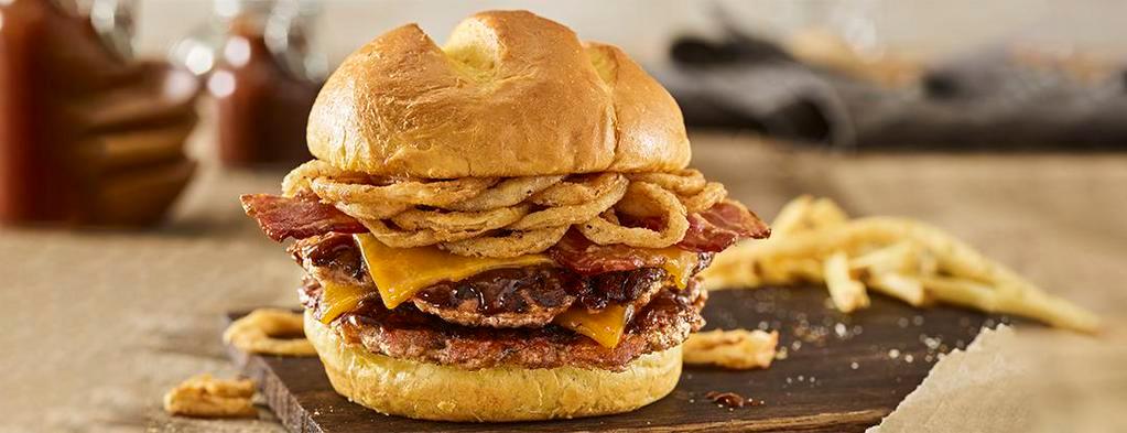 Double BBQ Bacon Cheddar Turkey Burger · Double Turkey burger, aged cheddar cheese, applewood smoked bacon, haystack onions, bbq sauce, toasted bun.