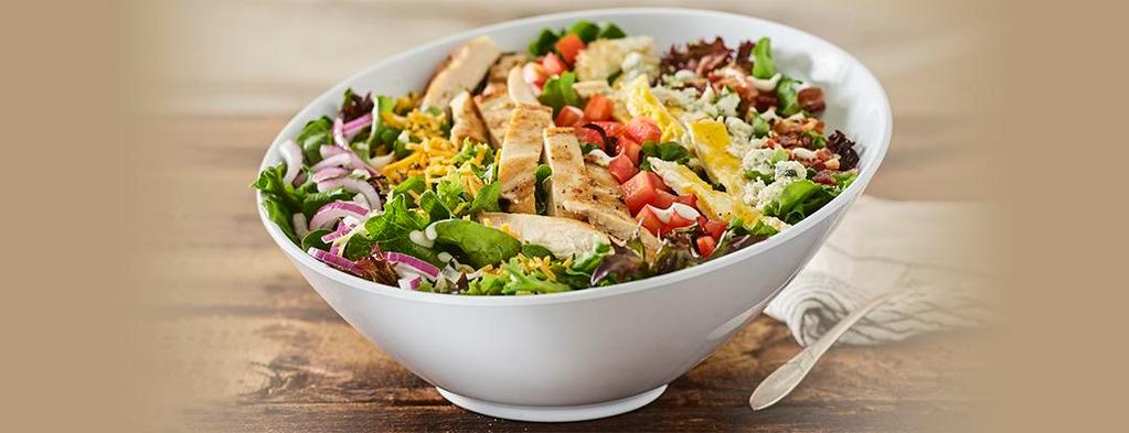 Cobb Salad · Mixed greens, bleu cheese, sharp cheddar cheese, fried egg, applewood smoked bacon, tomatoes, ranch.