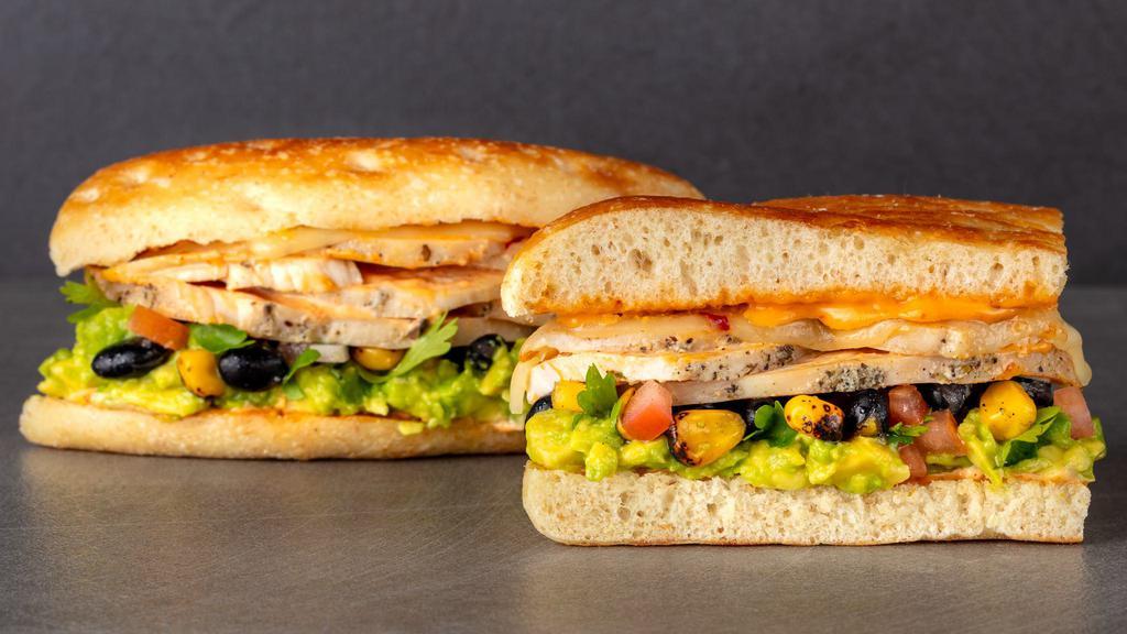 Southwest Chicken Sandwich · Roasted Cajun chicken, avocado, corn and black bean salsa, pepper jack cheese, chipotle aioli. Served with Urbane House Side salad.