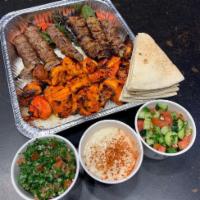 #23 Family Meal Pack - 3 Skewers of Chicken Kabob and 3 Beef Koubideh · Feeds for 4-5, Served with Rice, Shirazi Salad, Hummus, Grilled Tomatoes and Peppers