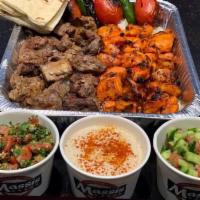 #25 Family Meal Pack - 3 Skewers of Chicken Kabob and 2 Beef Shish Kabob · Feeds for 4-5, Served with Rice, Shirazi Salad, Hummus, Grilled Tomatoes and Peppers