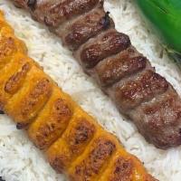 #12A/B Koubideh Combo · Two Skewers one of Ground Sirloin Beef and one Ground Chicken perfectly seasoned served with...