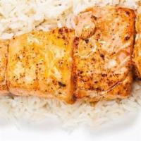 10 Skewers of Salmon Kabob · Served with Rice, Pita Bread and Grilled Tomatoes