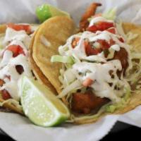 * Ensenada Fish Taco · Beer batter fish, cabbage, salsa fresca and house sauce.