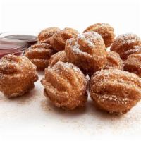 Churro Bites · Churro meets donut. The best of both worlds. Hot and crunchy on the outside and soft and flu...