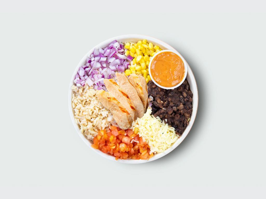Smokehouse Bowl · Brown rice, aged cheddar, black beans, red onions, tomatoes, corn, and spicy yogurt sauce.