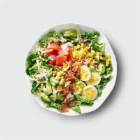 Cobb Salad · Romaine & field greens, hard boiled egg, avocado, bacon, aged cheddar, tomatoes, corn, greek...