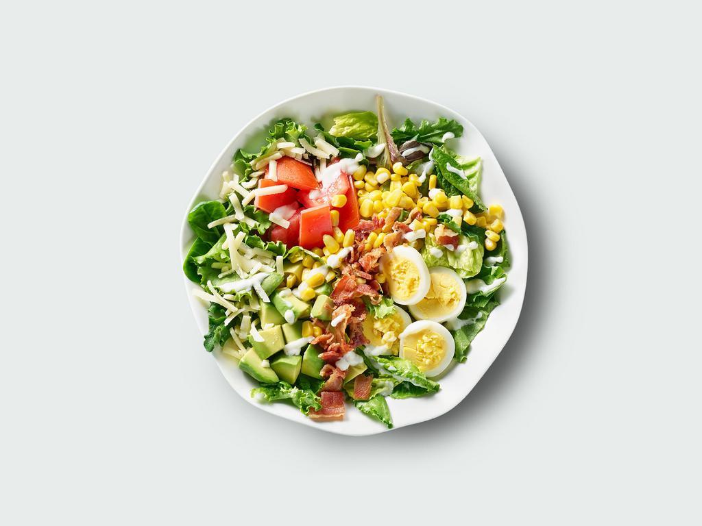 Cobb Salad · Romaine & field greens, hard boiled egg, avocado, bacon, aged cheddar, tomatoes, corn, greek yogurt ranch.