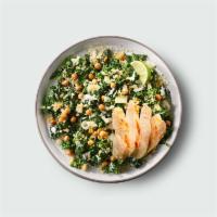 Kale Caesar Salad · Kale, quinoa, crispy chickpeas, parmesan cheese, hemp seeds, and greek yogurt caesar dressing.