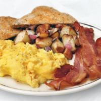 All-American Scrambler · Scrambled eggs with a side of bacon.