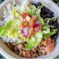 Brazilian Bowl · Meatless grounds, caramelized onions, chili, black beans, brown rice, topped w/ lettuce, tom...