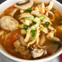 Tom Yum Soup  · Gluten-free. Famous Thai hot and sour soup with mushrooms, onions, and tomatoes. Garnished w...