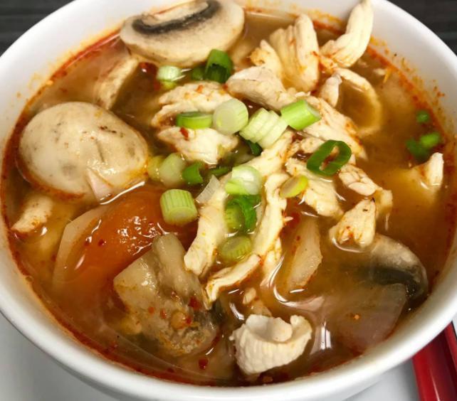 Tom Yum Soup  · Gluten-free. Famous Thai hot and sour soup with mushrooms, onions, and tomatoes. Garnished with minced green onions. Made with vegetable broth.
