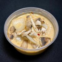 Tom Kha Soup  · Gluten-free. Thai traditional coconut milk soup cooked with onions and mushrooms. Garnished ...