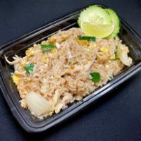 Thai Fried Rice · Traditional Thai fried jasmine rice mixed with eggs, tomatoes, and onions.
