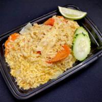 Yellow Curry Fried Rice · Gluten-free. Jasmine fried rice with yellow curry sauce, coconut milk, onions, bell peppers,...