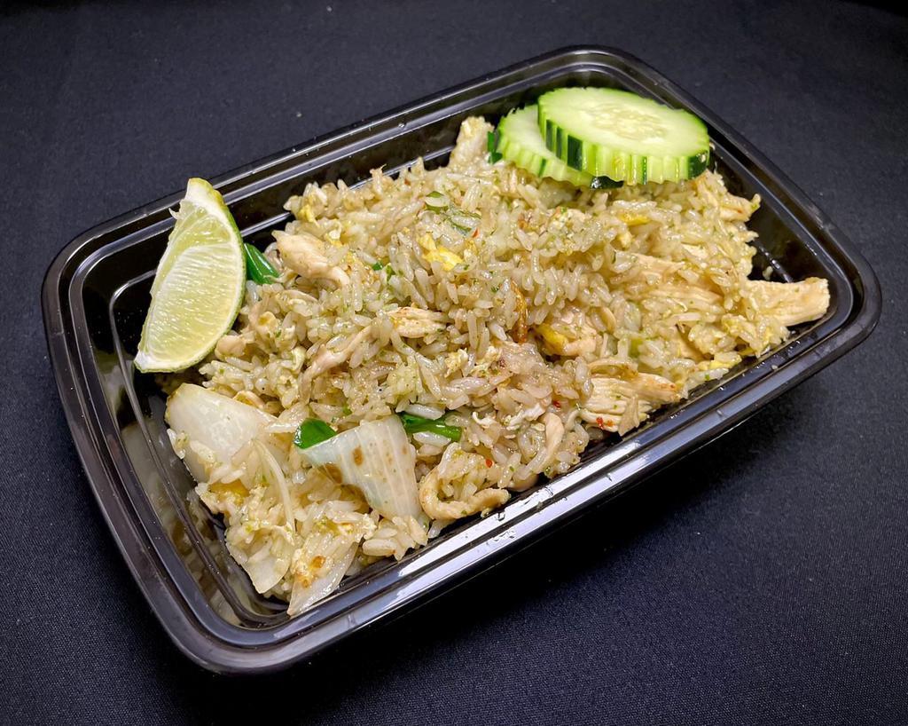 Garlic Fried Rice · Jasmine fried rice with garlic and cilantro Thai pesto, eggs, onions, and green onions.
