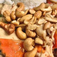 Cashew Nut Dish · Stir-fried onions, carrots, and bell peppers in our house special brown sauce topped with to...