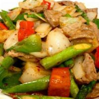 Volcano · Choice of meat stir fried in chef's special sauce with bell peppers, onions, tomatoes, mango...