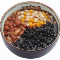 Grass Jelly Soup Signature · Includes mini taro balls, kidney beans, boba, and grass jelly soup. 