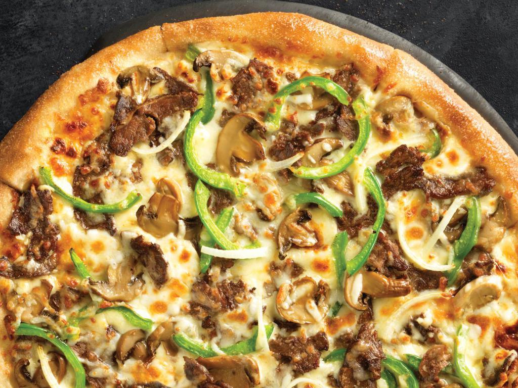 Original Crust Philly Pizza · Melty white cheese sauce piled high with tender shaved steak, marinated mushrooms, freshly sliced green peppers and onions, and our three fresh signature cheeses.