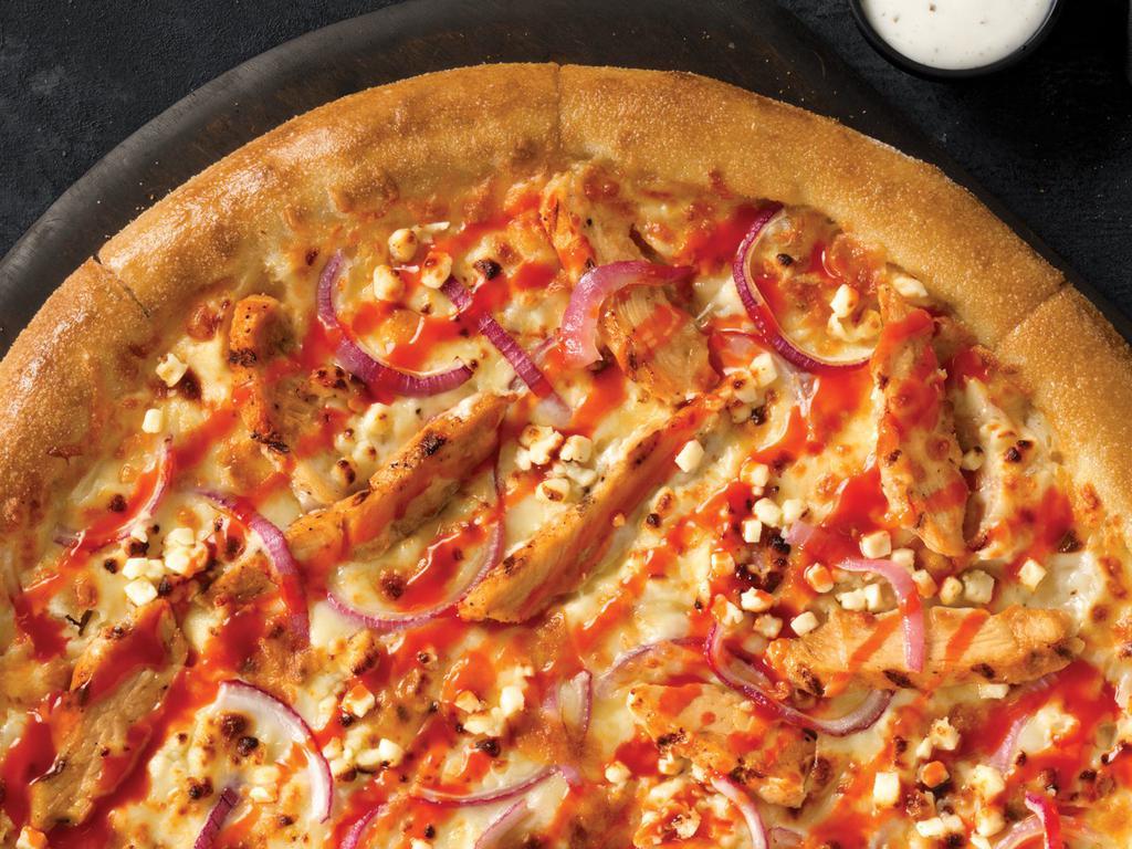 Buffalo Pizza · Bold Buffalo sauce and five fresh cheeses topped with grilled all-white-meat chicken and freshly sliced red onions. Served with your choice of ranch or blue cheese dipping sauce.