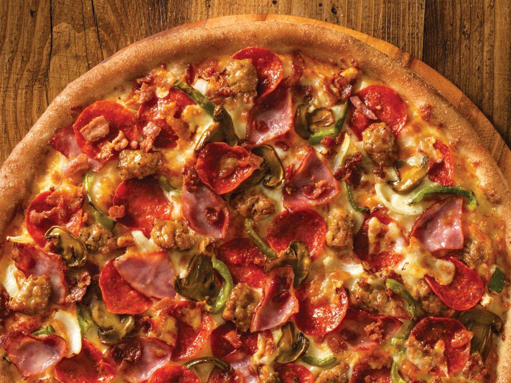 The Works Pizza Original Crust · Pepperoni, ham, green peppers, Italian sausage, mushrooms, bacon, onions, our signature sauce and 3-cheese blend.