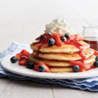 Berries and Cream Pancakes · Buttermilk pancakes, fresh berries, whipped cream, vanilla maple syrup.