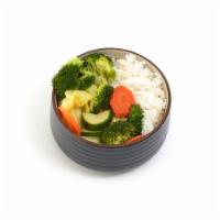 Veggie Bowl · A medley of steamed veggies (cabbage, zucchini, broccoli, &
carrots) served on a bed of rice.