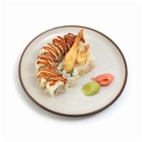 Crunch Roll · Shrimp Tempura, Crabmeat & Avocado Inside with tempura crunch
on top.