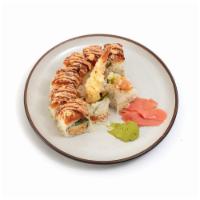 Yogis Roll · Spicy crabmeat, cucumber, & shrimp tempura inside with
spicy tuna & crunch on top.